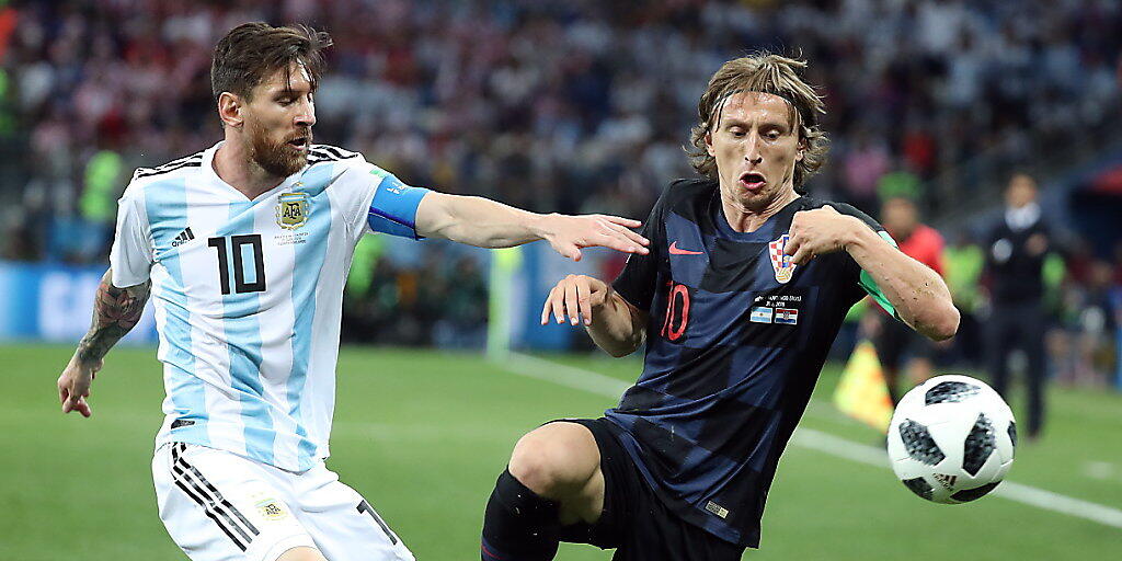 Rivalen in der Meisterschaft, aber auch an der WM: Lionel Messi und Luka Modric
