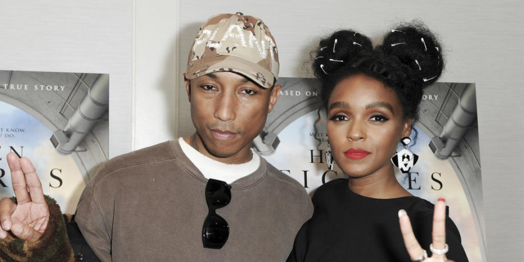 Pharrell Williams (l) und Janelle Monae warten im Januar 2017 in Los Angeles auf die Vorführung des Films "Hidden Figures". (Archiv)