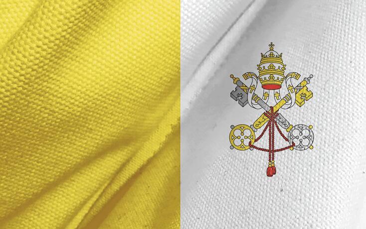 Closeup of grunge Vatican flag