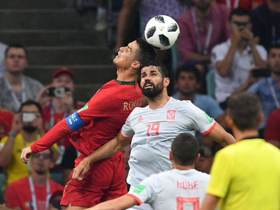 Diego Costa (rechts) und Cristiano Ronaldo (links) haben ihre Treffsicherheit in ihrem ersten WM-Spiel in Russland bewiesen. Beim 3:3 im Direktduell traf Ronaldo für Europameister Portugal dreifach, Costa für Spanien doppelt