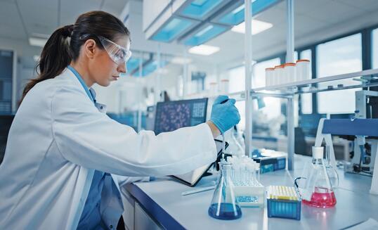 Modern Medical Research Laboratory: Female Scientist Working with Micro Pipette, Analysing Biochemicals Samples. Advanced Scientific Lab for Medicine, Microbiology Development.