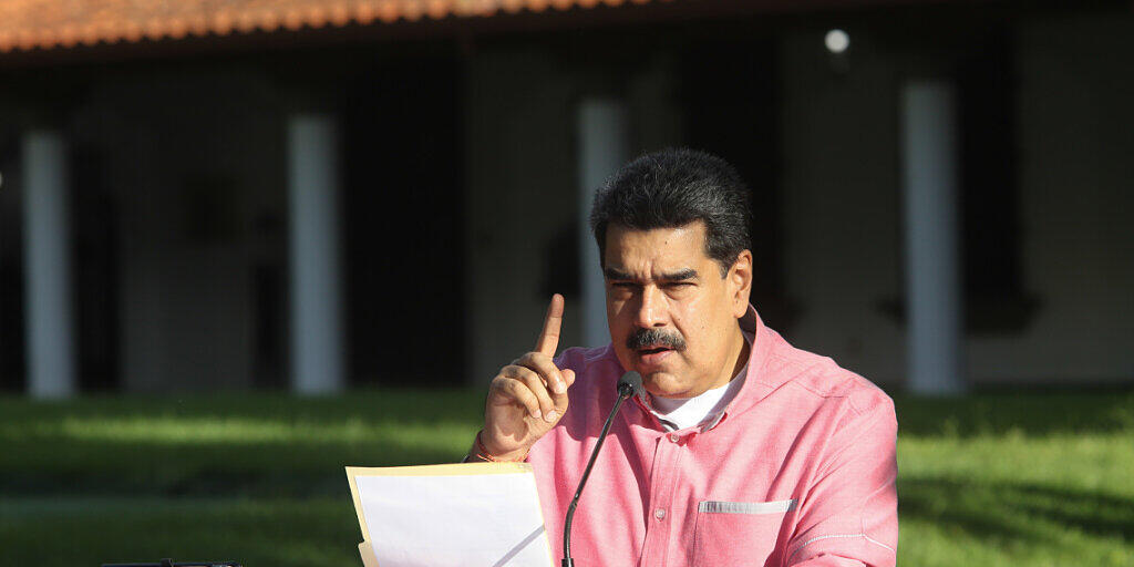 HANDOUT - Nicolas Maduro, Präsident von Venezuela, bei einer Pressekonferenz in Caracas. Foto: Prensa Miraflores/dpa - ACHTUNG: Nur zur redaktionellen Verwendung und nur mit vollständiger Nennung des vorstehenden Credits