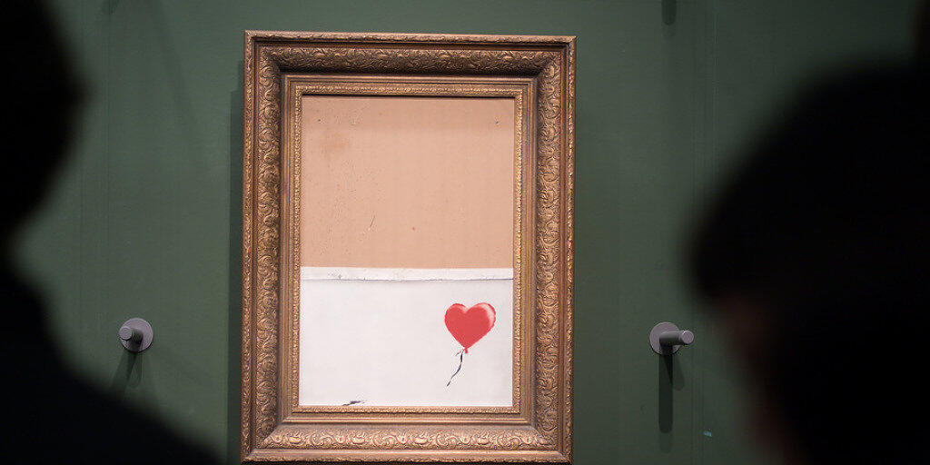 Banksy, der Marketingstratege: Indem der britische Street-Art-Künstler sein "Girl with Balloon" schredderte, schuf er mit "Love is in the Bin" ein neues Objekt der Begierde.