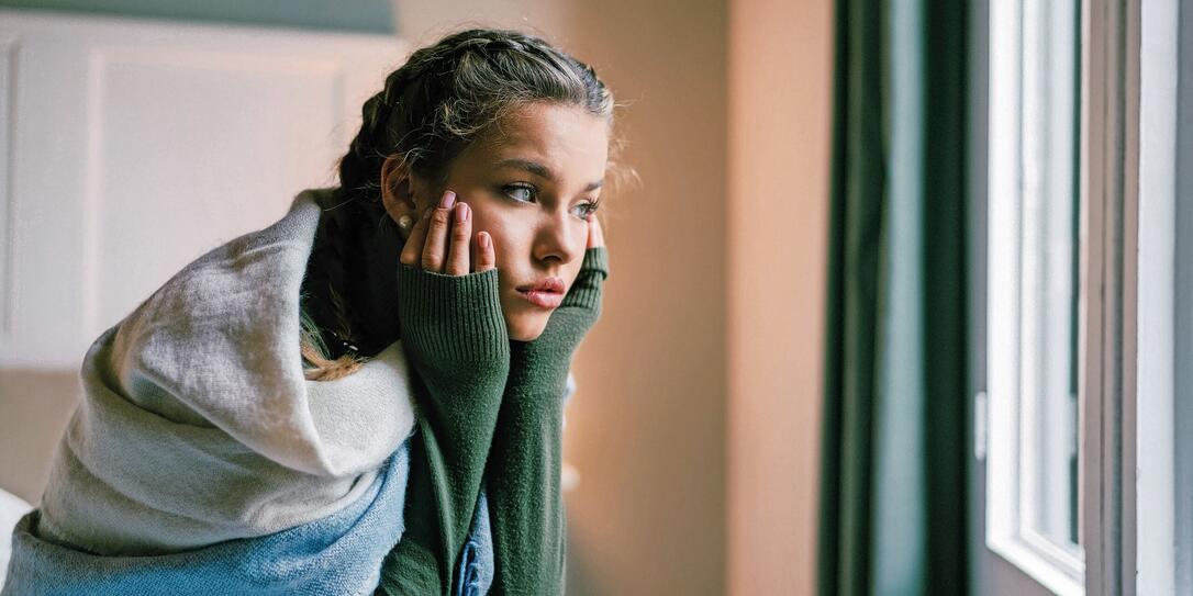 Depressed girl at home
