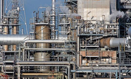 Part of refinery facility with complicated pipe system