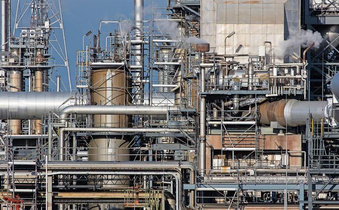 Part of refinery facility with complicated pipe system