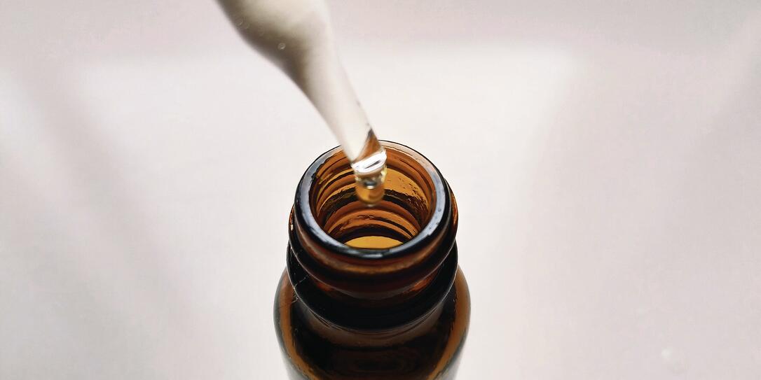 Remedy drops in an open bottle