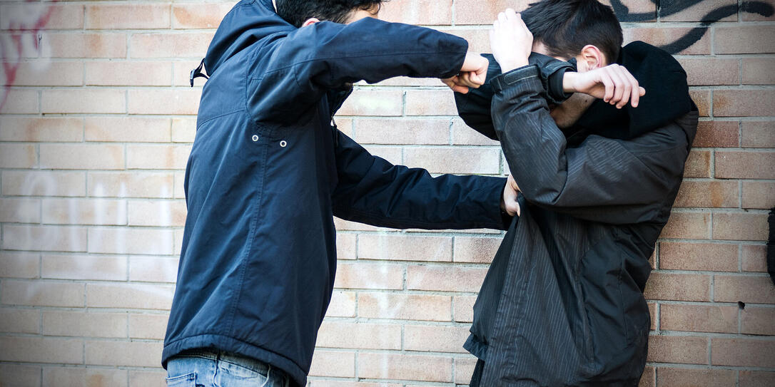 Bullying scene between two adult teenagers