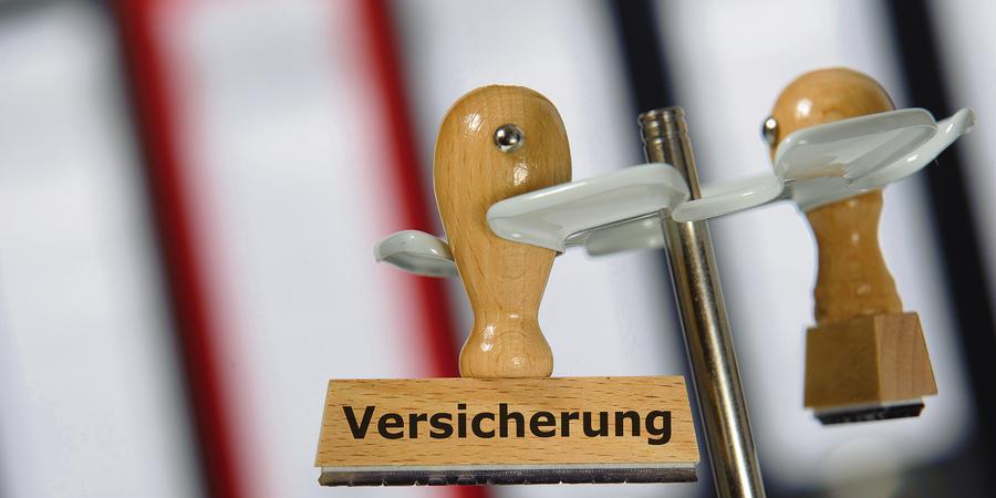 A stamp with the word Versicherung on it