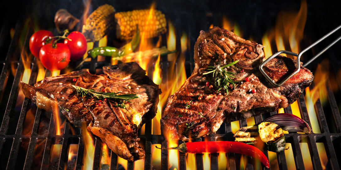 Beef T-bone steaks on the grill