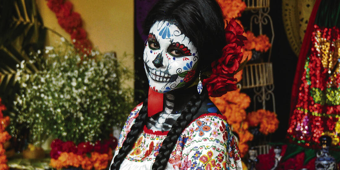 Puebla, Mexico - October 31st, 2013 : Woman disguised for Dia de los Muertos