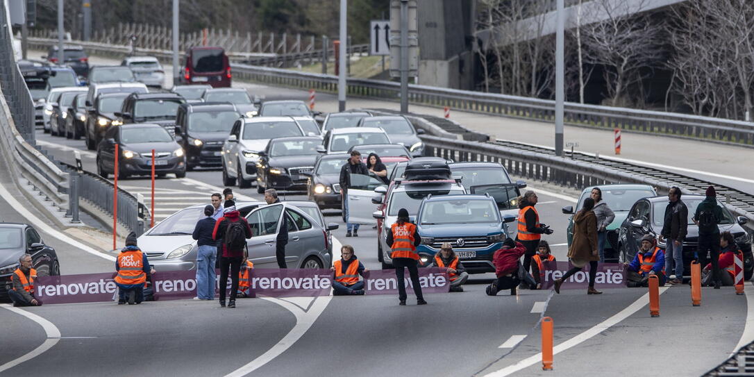 Climate activists block a highway at Gotthard tunnel during Easter travels