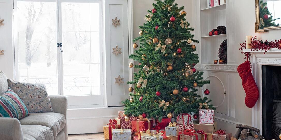 Christmas tree surrounded with gifts Christmas tree surrounded with gifts