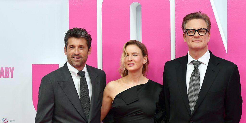 Bridget Jones (M, Renée Zellweger) zwischen den beiden potenziellen Vätern ihres Babys, Jack (l, Patrick Dempsey) und Marc Darcy (r, Colin Firth). Bridget Jones (M, Renée Zellweger) zwischen den beiden potenziellen Vätern ihres Babys, Jack (l, Patrick Dempsey) und Marc Darcy (r, Colin Firth).