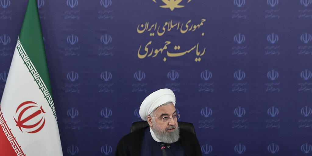 HANDOUT - Hassan Ruhani, Präsident vom Iran, leitet eine Sitzung des Nationalkomitees. Foto: -/Iranian Presidency/dpa - ACHTUNG: Nur zur redaktionellen Verwendung im Zusammenhang mit der aktuellen Berichterstattung und nur mit vollständiger Nennung des vorstehenden Credits HANDOUT - Hassan Ruhani, Präsident vom Iran, leitet eine Sitzung des Nationalkomitees. Foto: -/Iranian Presidency/dpa - ACHTUNG: Nur zur redaktionellen Verwendung im Zusammenhang mit der aktuellen Berichterstattung und nur mit vollständiger Nennung des vorstehenden Credits